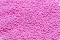 Plastic pellets. Colorant for polymers in granules. Royalty Free Stock Photo