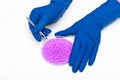 Plastic pellets . Colorant for polymers in granules. Plastic pellets in the hands with gloves and tweezers Royalty Free Stock Photo