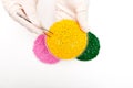 Plastic pellets . Colorant for polymers in granules. Plastic pellets in the hands with gloves and tweezers Royalty Free Stock Photo