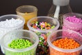 Plastic pellets. Dyes for plastic, polypropylene, polyethylene. Plastic granules in a measuring container and test tubes in the