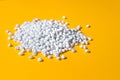 Plastic pellets. White Colorant for plastics . Plastic Raw material Royalty Free Stock Photo