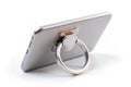 Plastic phone ring holder with a foldable stand Royalty Free Stock Photo