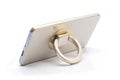 Plastic phone ring holder with a foldable stand Royalty Free Stock Photo