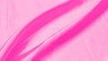 Plastic pink satin fabric texture soft blur background Royalty Free Stock Photo