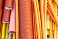 Plastic pipes in black, red, orange and yellow Royalty Free Stock Photo