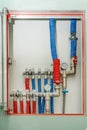 Plastic pipes of central heating system and water pipes in apartment