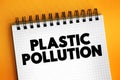 Plastic Pollution - accumulation of plastic objects and particles in the Earth\'s environment, text concept background Royalty Free Stock Photo