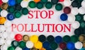 Plastic pollution concept. Refuse single-use plastic. Words Stop Pollution in the center of colored background of