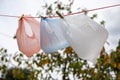 Plastic pollution of the environment with disposable multi-colored bags, horizontal Royalty Free Stock Photo