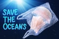 Plastic pollution in ocean environmental problem concept. jellyfish swim inside plastic bag floating in the ocean