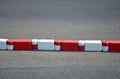 Plastic protection divides the roadway into two halves plastic parts red and white are intended to prevent vehicle entry