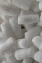 Plastic protective foam background and texture. Macro view of white packing foam background. Bubbly plastic protective granules. Royalty Free Stock Photo