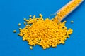 Plastic raw materials in granules for industry.Yellow Polymer on Royalty Free Stock Photo