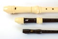 Plastic recorder flute set. Sopranino, soprano and alto flutes Royalty Free Stock Photo