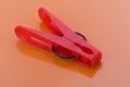 Plastic red clothes pin Royalty Free Stock Photo