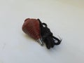 Plastic Red Color Spinning Top of Buguri with Black thread on white background
