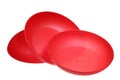 Plastic red piattis on a white background Royalty Free Stock Photo