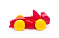 Plastic red racing toy car toy with yellow wheels Royalty Free Stock Photo