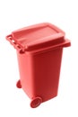 Plastic red trash can isolated on white background Royalty Free Stock Photo