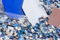 Plastic regrind with samples and test-glass Royalty Free Stock Photo