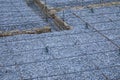 Plastic reinforcement fixers.  Iron wire mesh for concreting floors of buildings. Royalty Free Stock Photo