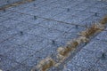 Plastic reinforcement fixers.  Iron wire mesh for concreting floors of buildings. Royalty Free Stock Photo