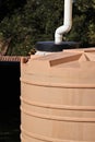 A plastic residential water tank that harvests water from a roof