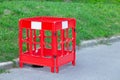 plastic road sign red warning around asphalt ground hole outdoor infrastructure object Royalty Free Stock Photo