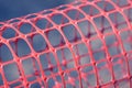 Plastic safety net for construction site. Construction mesh. Royalty Free Stock Photo