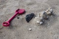 Plastic sandbox toys on the sand. kids toys on tropical sand beach Royalty Free Stock Photo