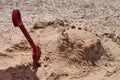 Plastic sandbox toys on the sand. kids toys on tropical sand beach Royalty Free Stock Photo