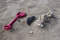 Plastic sandbox toys on the sand. kids toys on tropical sand beach Royalty Free Stock Photo