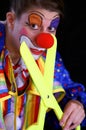 Plastic scissors and clown