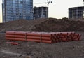 Plastic sewer pipes for laying an external sewage system at a construction site. Sanitary drainage system for a multi-story Royalty Free Stock Photo