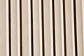 Plastic siding wall texture in brown tone. Royalty Free Stock Photo