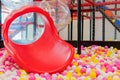 plastic slide with colourful balls for the kid& x27;s playground Royalty Free Stock Photo