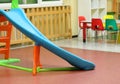 Plastic slide in the playground of a kindergarten