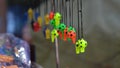 plastic small whistles hanging on toyshop hd