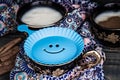 Plastic Smiley Face Template to Put Powder Cinnemon Royalty Free Stock Photo