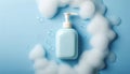 Plastic soap dispenser bottle with pump surrounded by foam and bubbles on blue background. Flat lay composition for bath Royalty Free Stock Photo