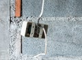 Plastic socket with the electrical wire. Royalty Free Stock Photo