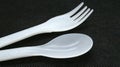 Plastic spoon and fork isolated on black background Royalty Free Stock Photo