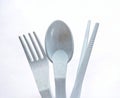 plastic spoon, fork,and chopsticks on white background Royalty Free Stock Photo