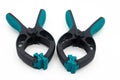 Plastic spring clamps on a white background Royalty Free Stock Photo