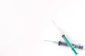 Plastic Syringe isolated stock image on texture background. Royalty Free Stock Photo
