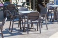 Plastic tables with chairs in a restaurant