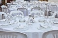 Plastic tables setting for an outdoor reception. Royalty Free Stock Photo