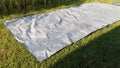 Plastic tarpaulins are spread out in the yard Royalty Free Stock Photo