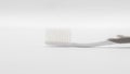 Plastic toothbrush on grey background Royalty Free Stock Photo