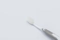 Plastic toothbrush on grey background Royalty Free Stock Photo
